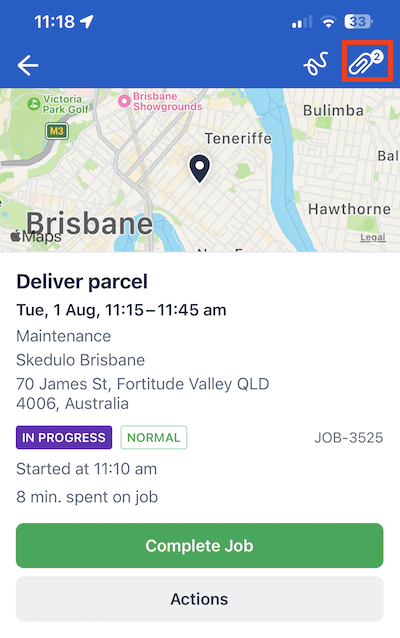 The job details screen showing the number of attachments on the paperclip icon.